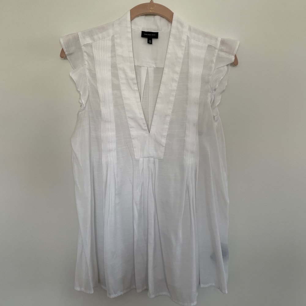 White flutter sleeve blouse